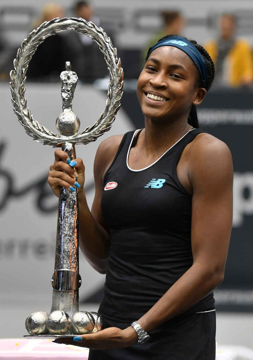 , Wimbledon sensation Coco Gauff, 15, awkwardly handed bottle of wine after winning first WTA singles title