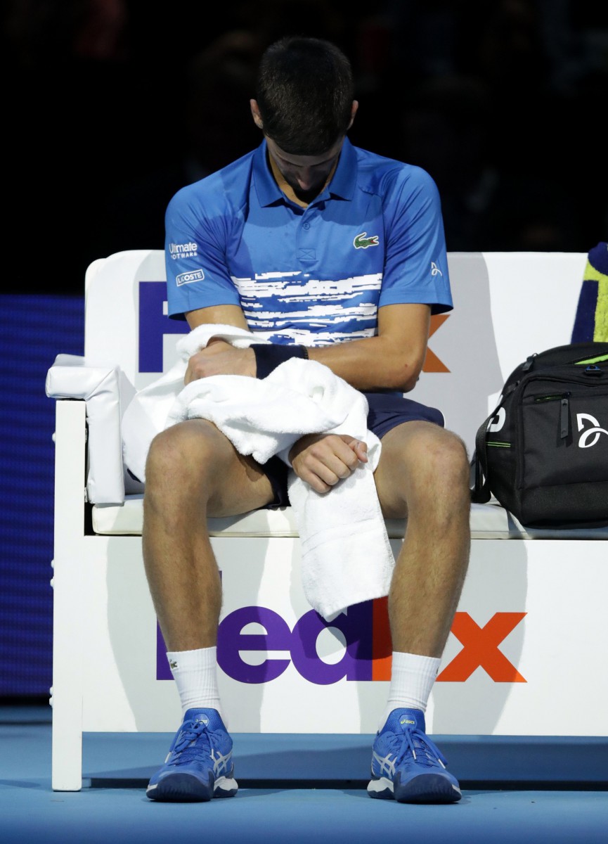 Djokovic was clearly struggling with his right elbow during the second set and could not handle Federer