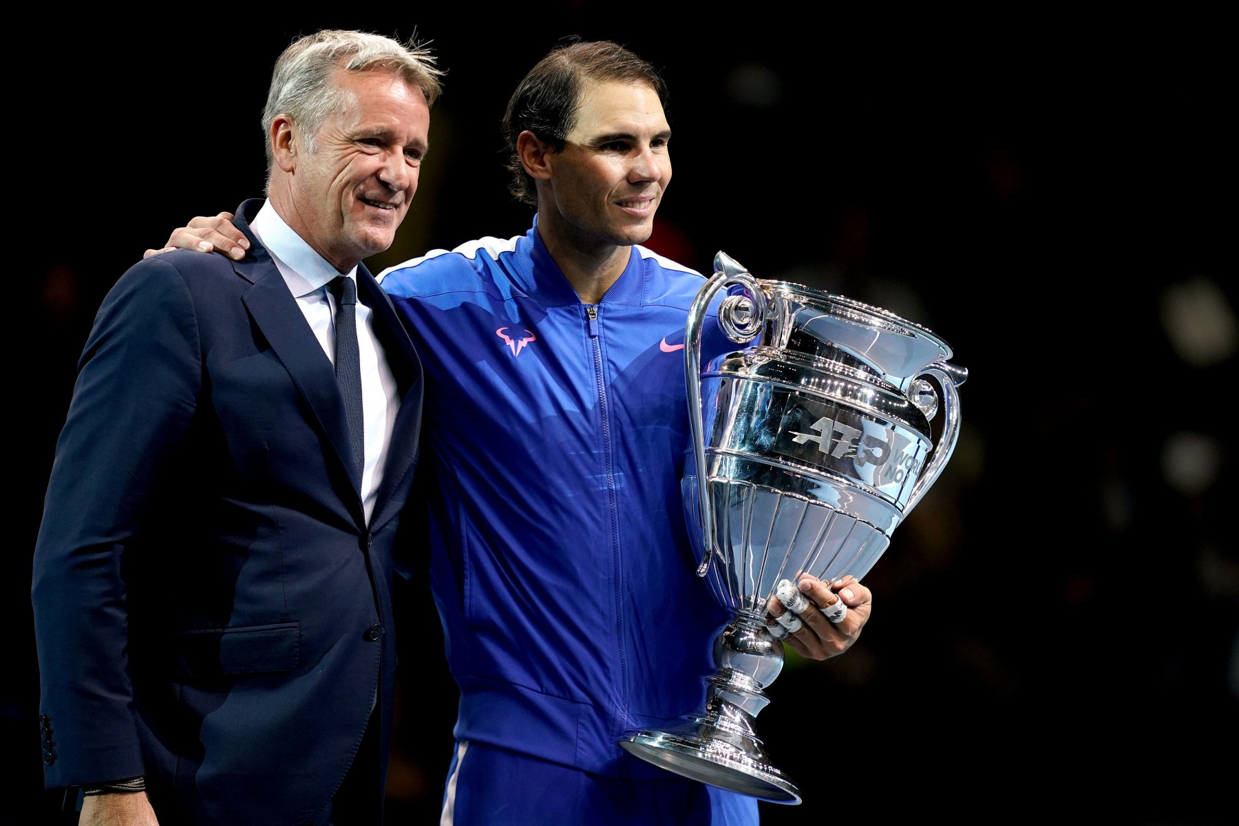 Out-going ATP chief Chris Kermode handed over the silverware after Nadal beat Stefanos Tsitsipas at the O2 Arena