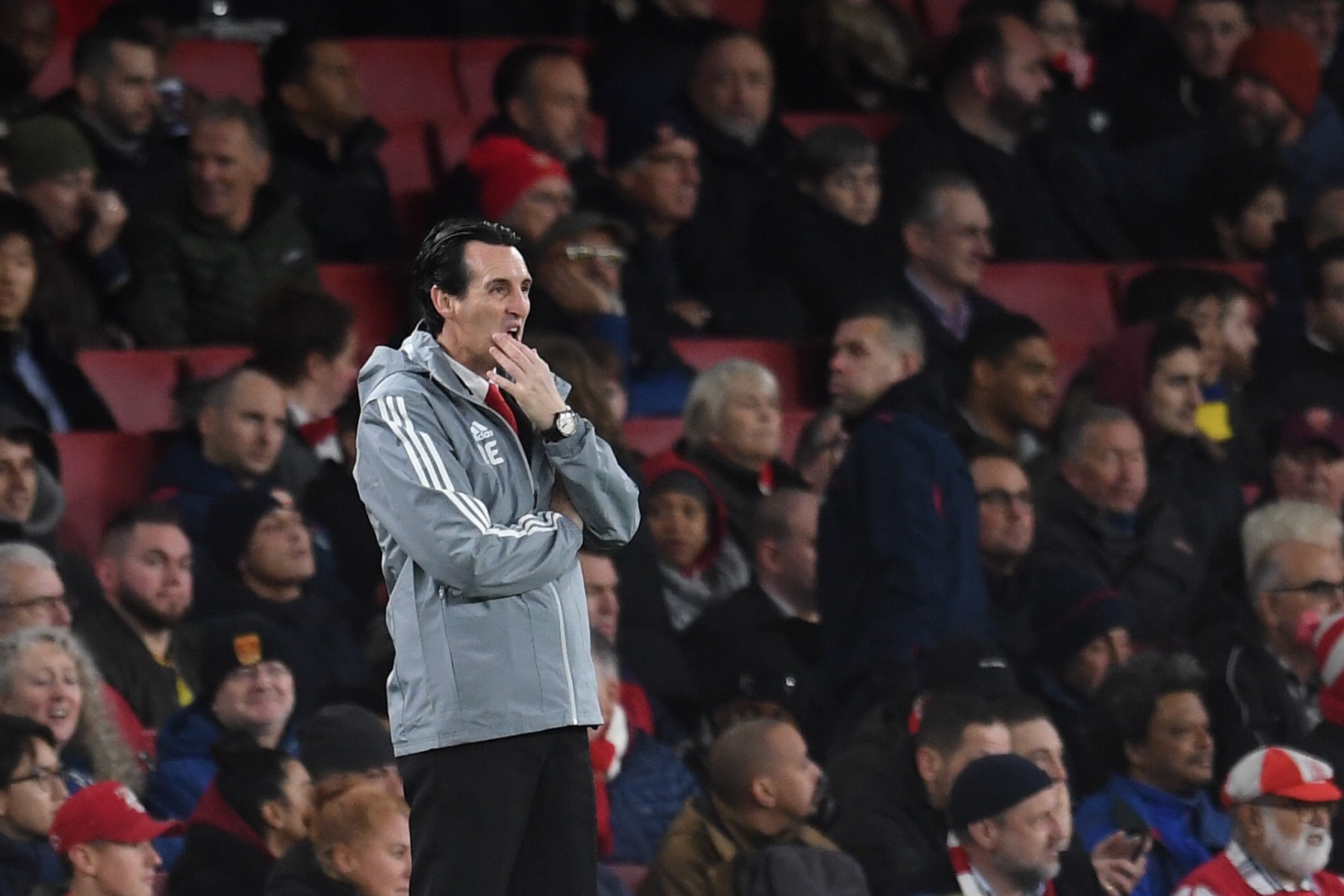 , Bored Arsenal fan plays cards instead of watching humiliating Eintracht Frankfurt loss as Emery gets the sack