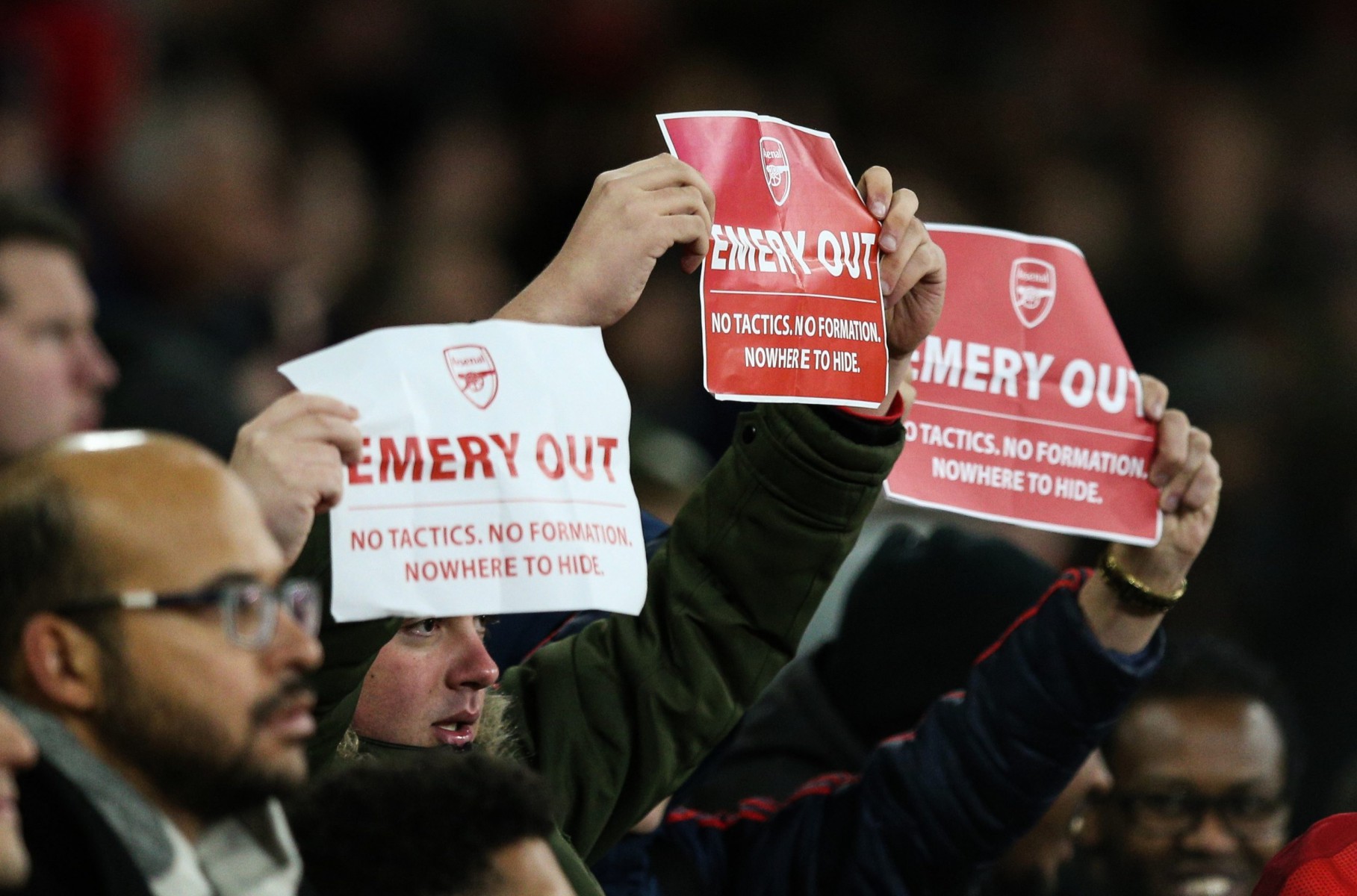 , Bored Arsenal fan plays cards instead of watching humiliating Eintracht Frankfurt loss as Emery gets the sack