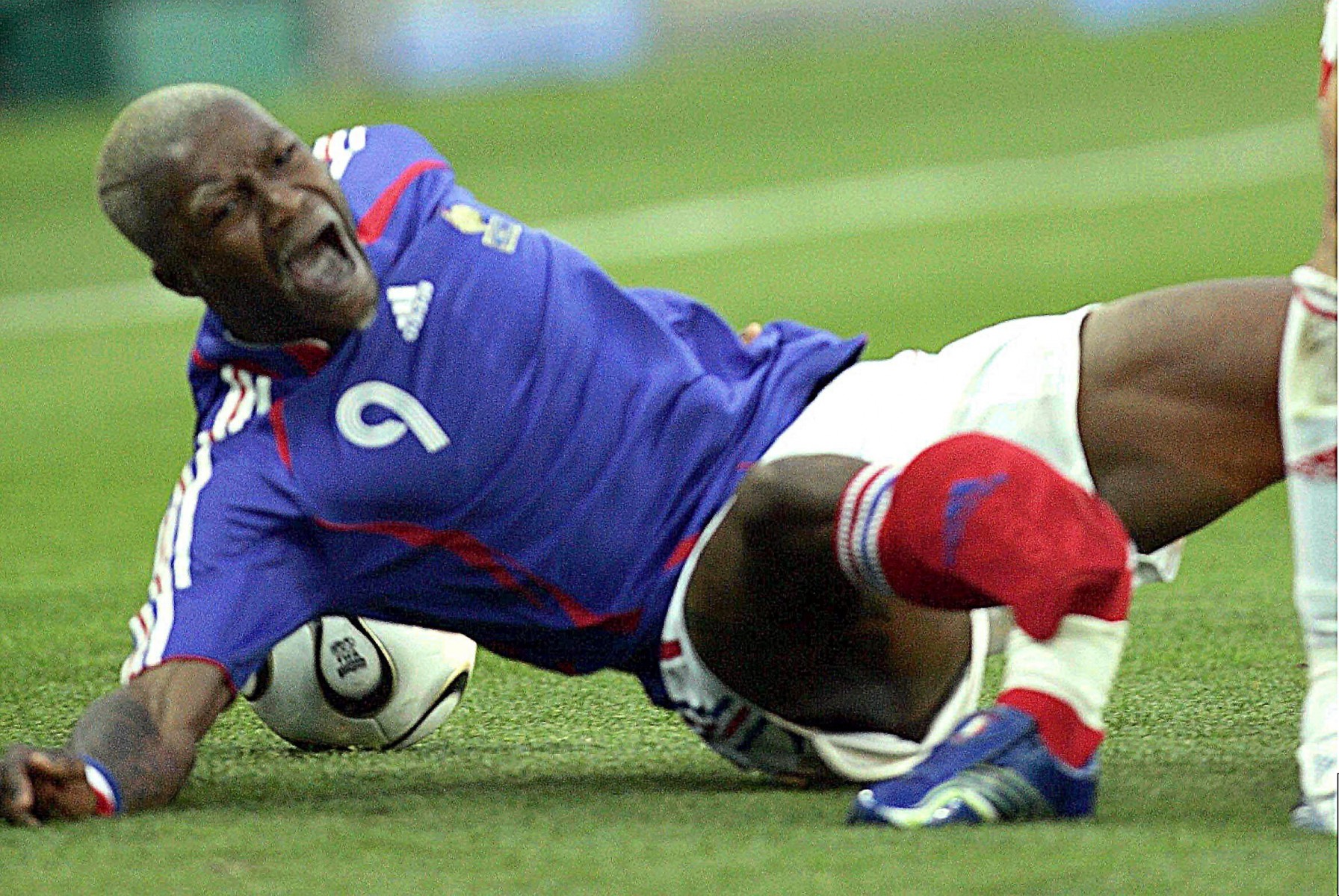 Cisses leg folds in a World Cup warm-up game, meaning he missed the 2006 tournament in Germany