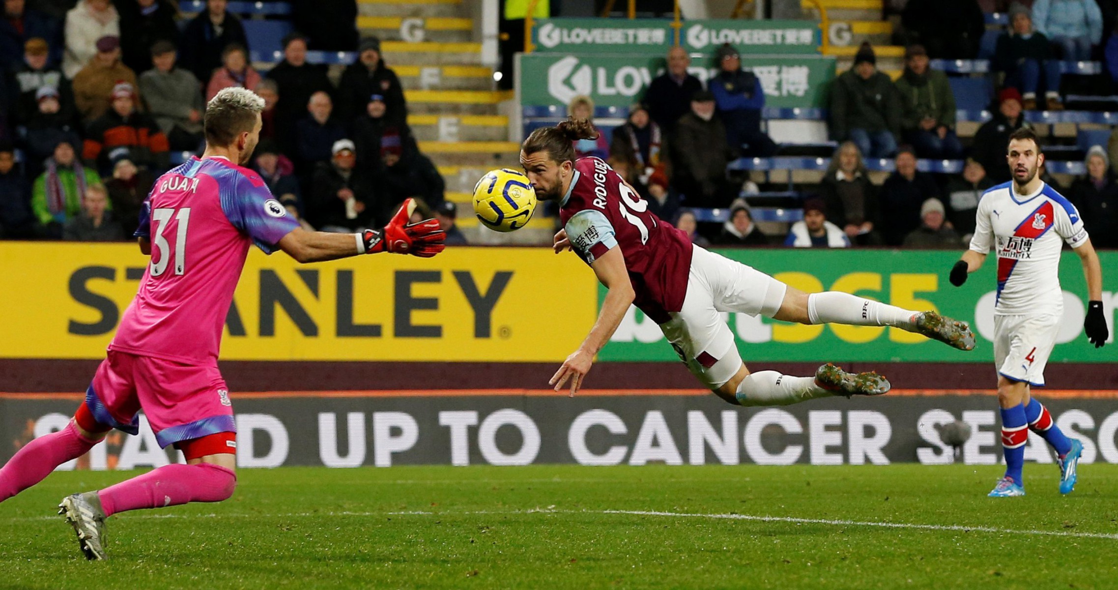 Burnley striker Jay Rodriguez is thwarted by Spanish stopper Vicente Guaita 