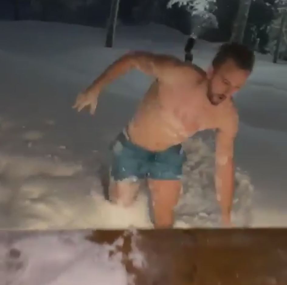 , Watch Spurs star Harry Kane dive face first into a snow drift wearing only his shorts on trip to Santas home in Finland