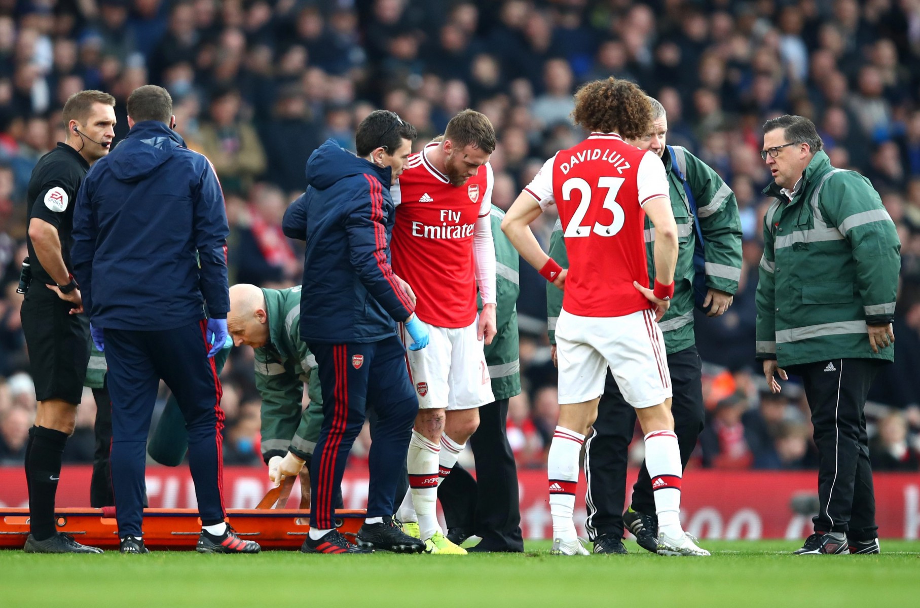 , Arsenal blow as Calum Chambers forced off with knee injury just 20 minutes into Chelsea clash