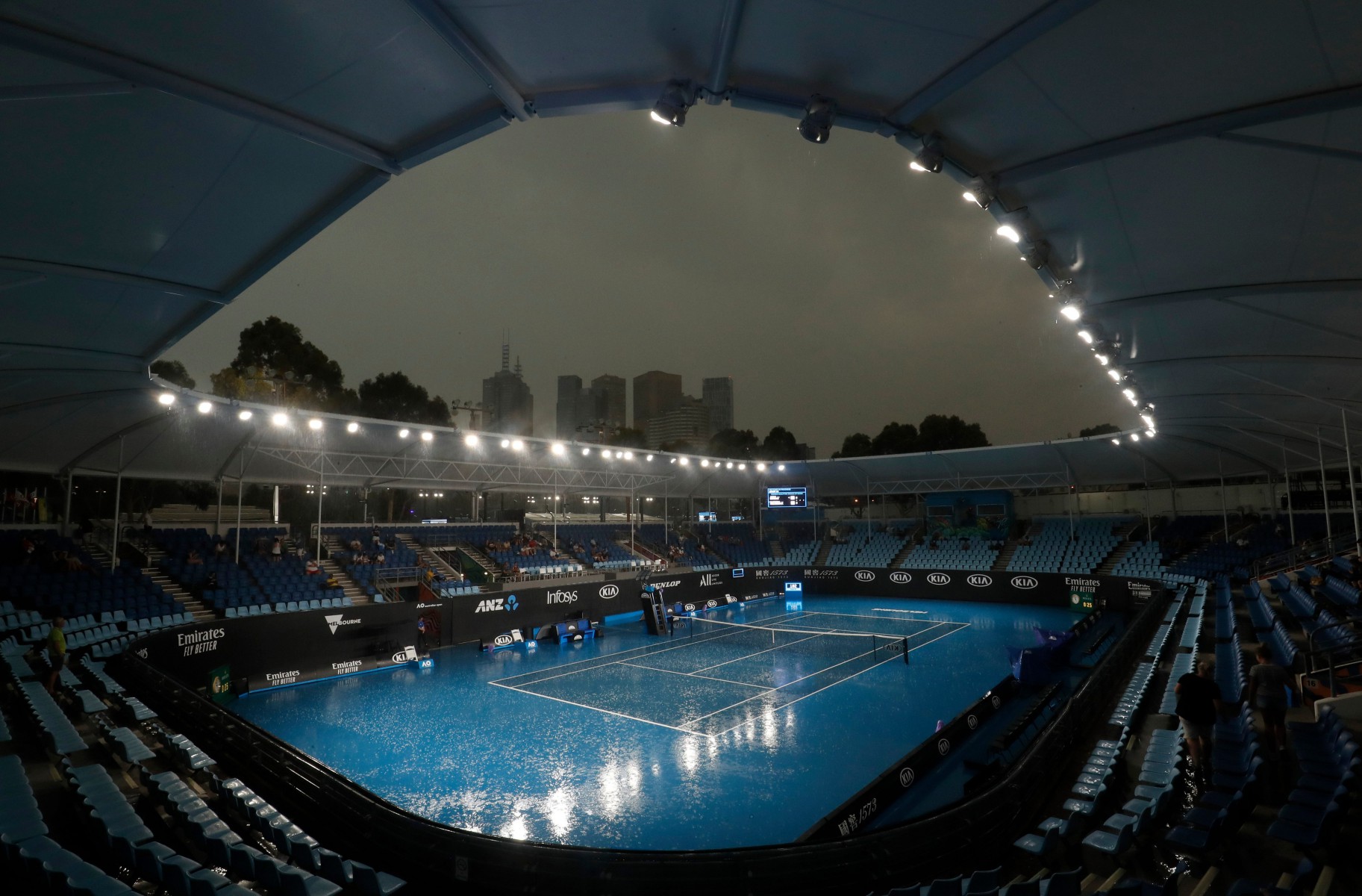 , Australian Open matches axed as huge downpours and bushfire smoke create hazardous air to put tournament under threat