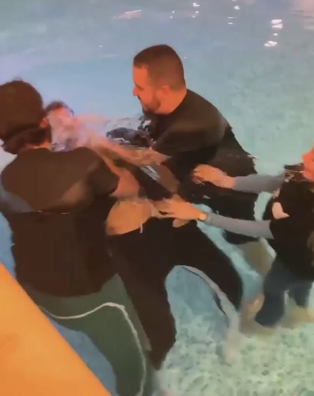 , Watch Liverpool star Alisson cry as Firmino is baptised in his own swimming pool in emotional ceremony