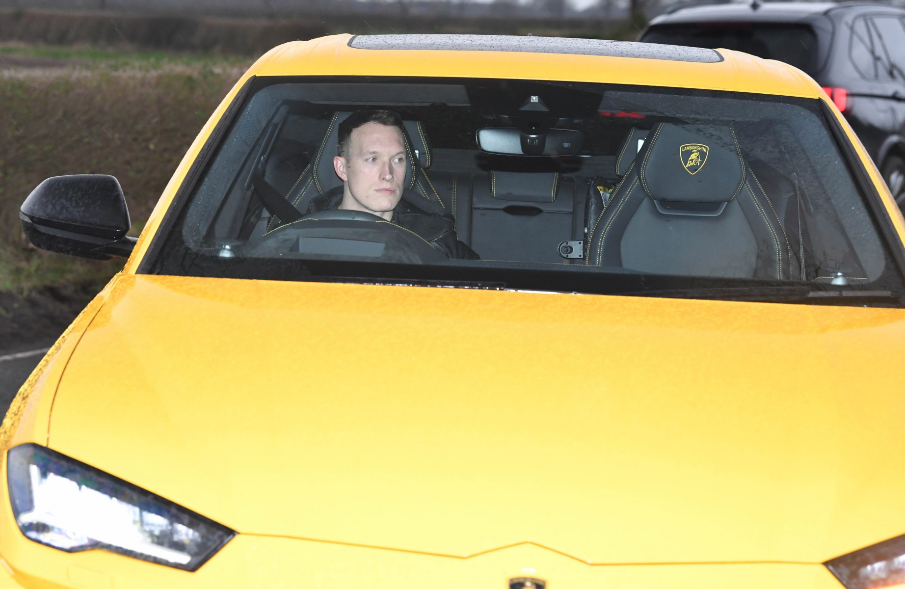 Phil Jones was behind the wheel in his flash yellow Lamborghini