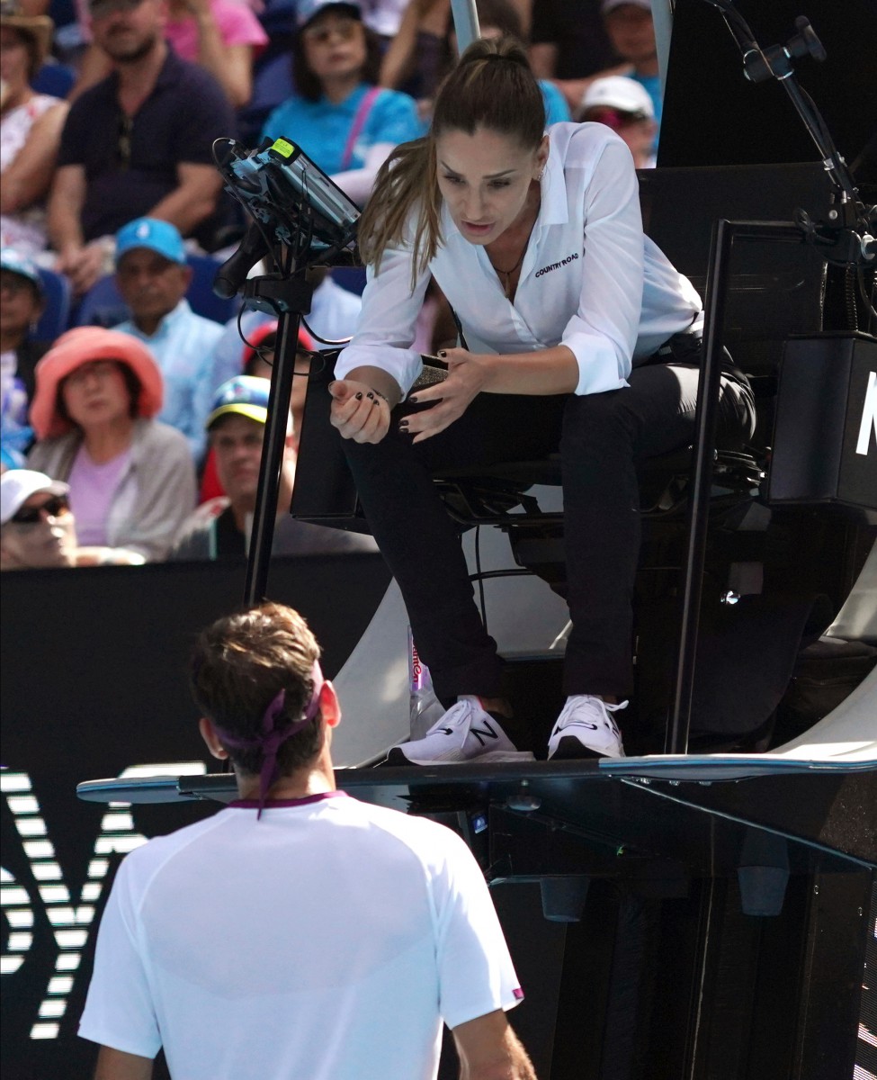 The Swiss great was also given a warning for swearing by chair umpire Marijana Veljovic