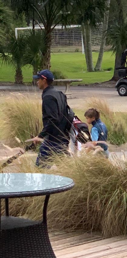 , Tiger Woods caddies for son Charlie at junior golf tournament as fans marvel at 10-year-olds swing