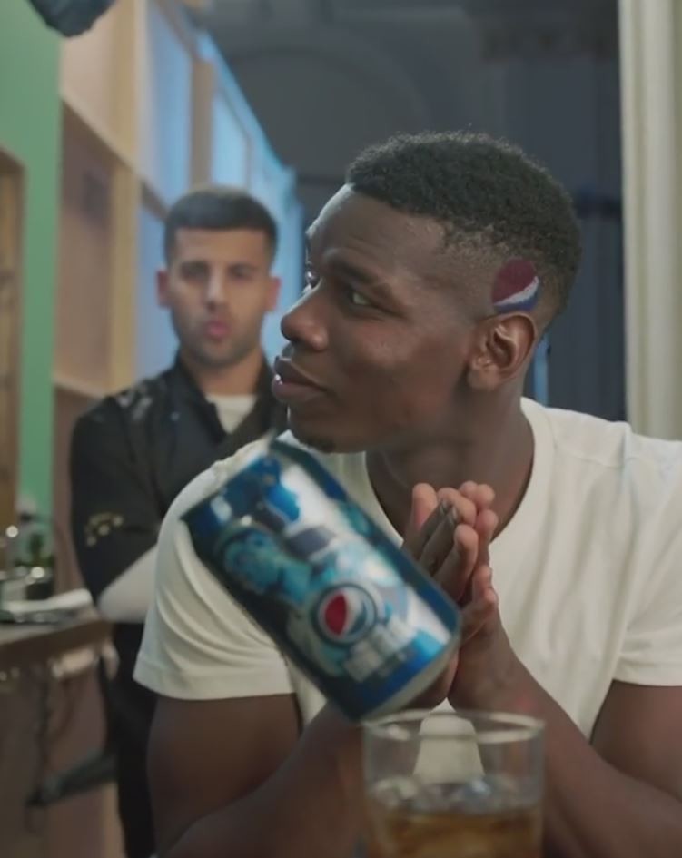 , Watch Paul Pogbas amazing trick with Pepsi can as Man Utd star gets hair trimmed in brilliant new advert