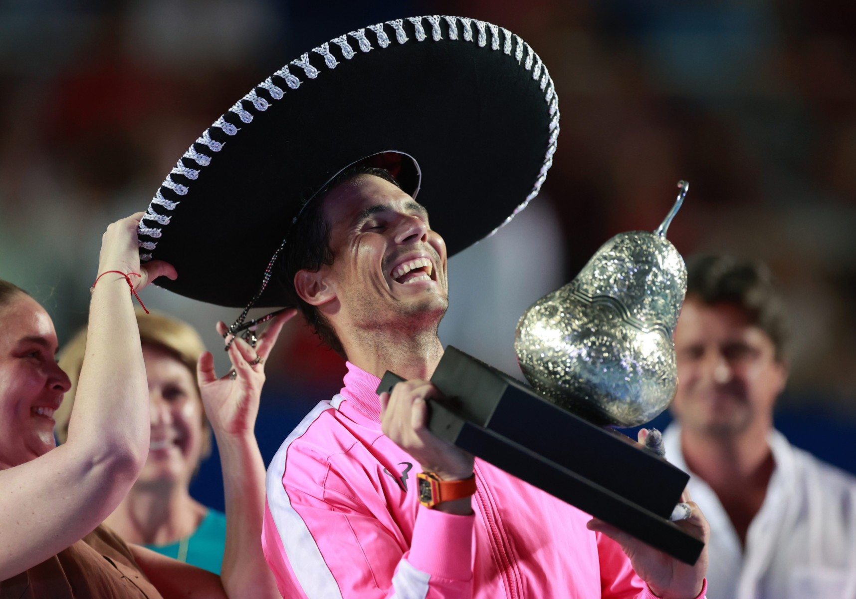 Rafael Nadal dons his sombrero after winning a hat-trick of titles at the Mexico Open