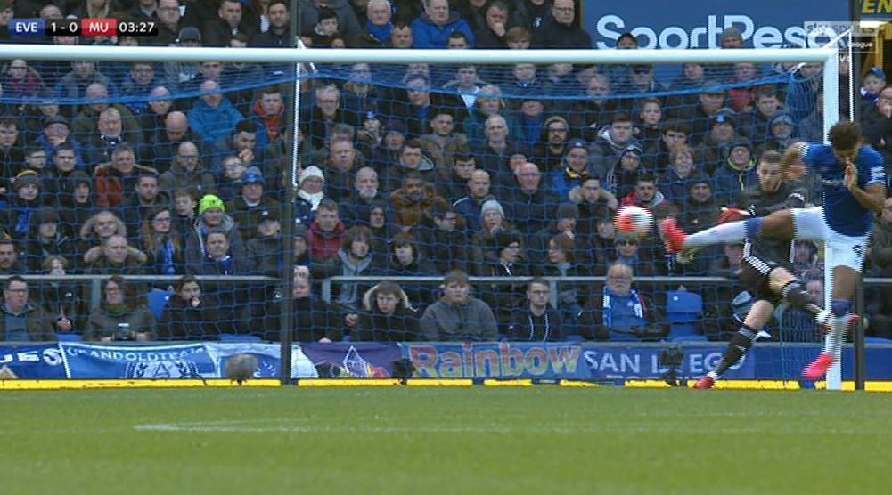 The ball cannoned back off the Everton striker's foot as he dangled it out to make the block