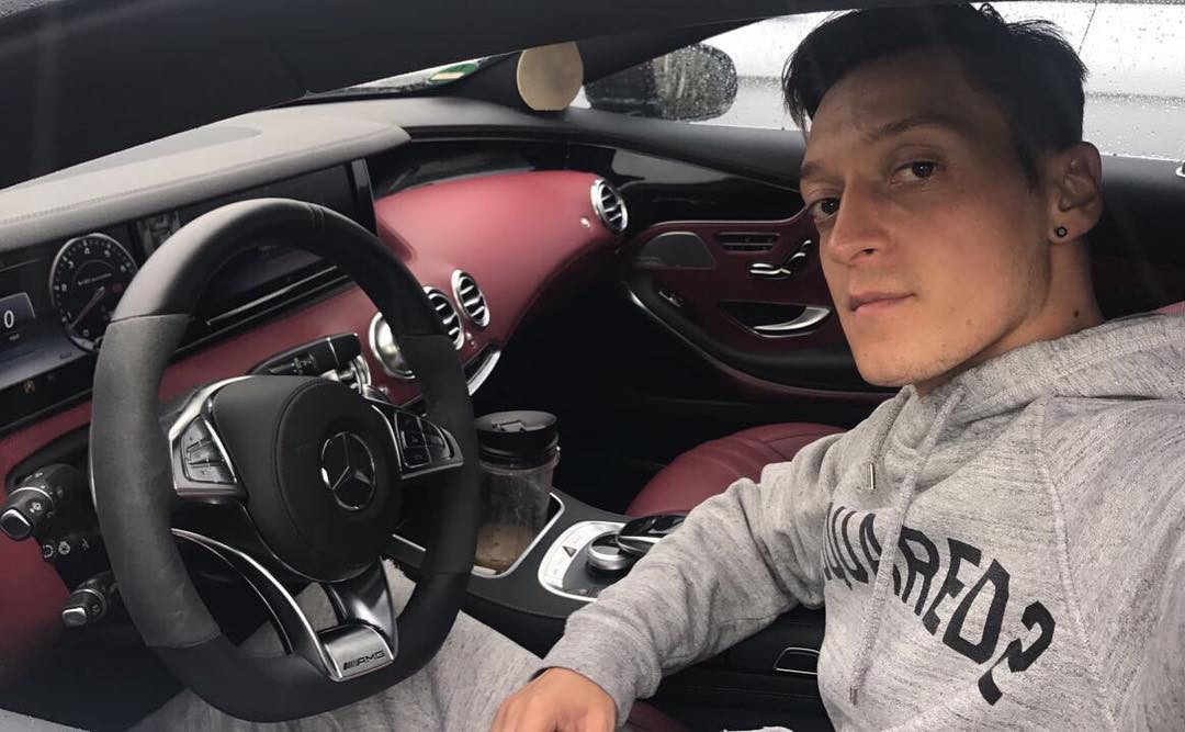 , Inside Arsenal pay cut rebel Mesut Ozil’s £10m London home complete with personalised doors and £800k car collection