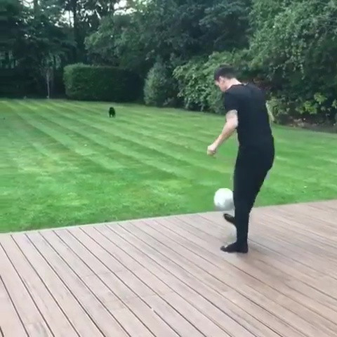 Ozil often ventures out into his sprawling garden and performs kick-ups