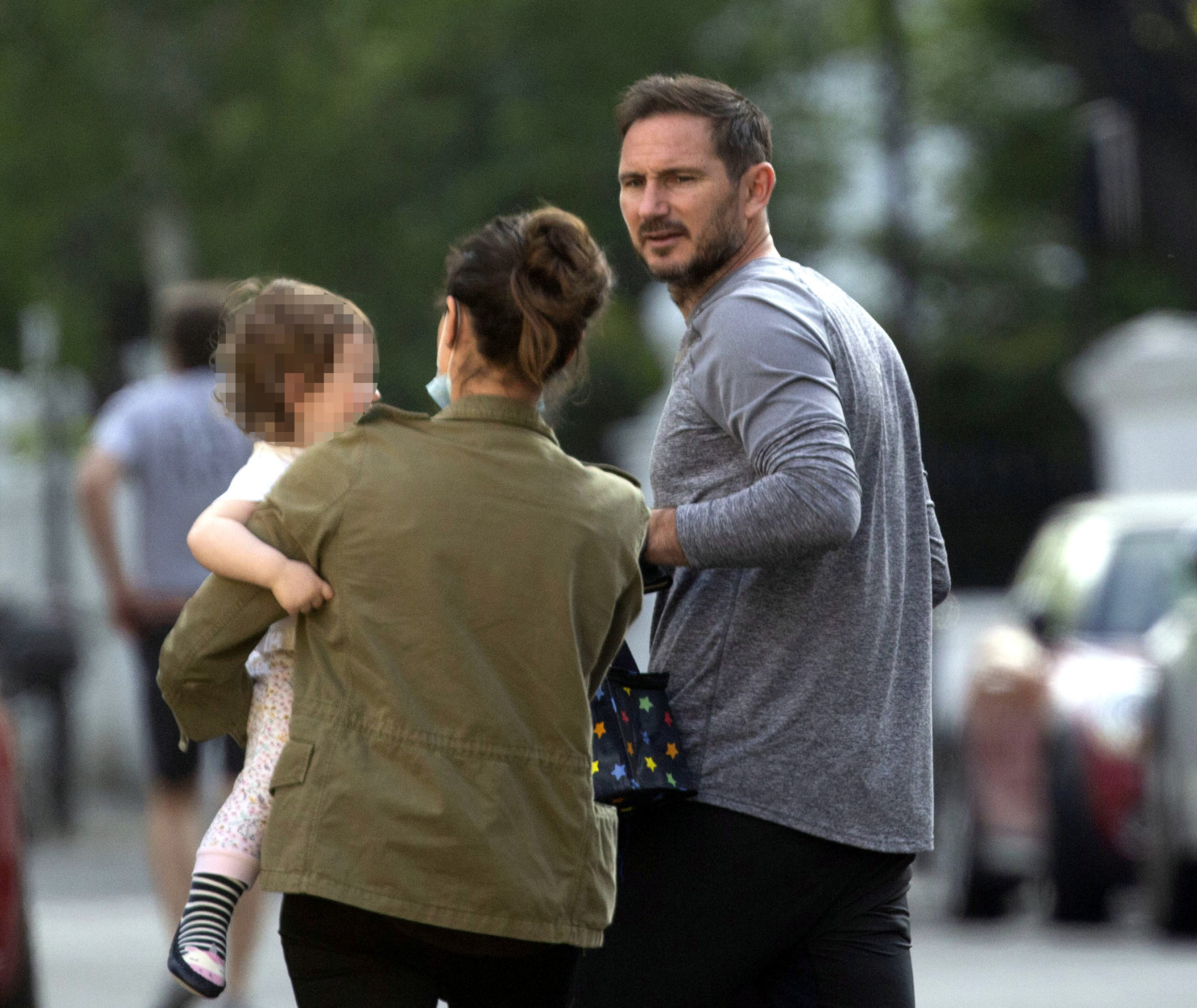 , Chelsea boss Frank Lampard and masked wife Christine pop out with baby as Blues manager counts down to Prem return