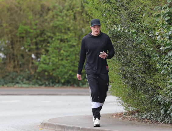 , Man Utd star Phil Jones stretches his legs and gets some fresh air near home on his own during isolation in Cheshire