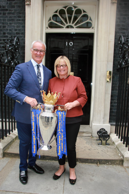 Claudio and Rosanna pose with the Premier League trophy after he led 5,000-1 outsiders Leicester to an incredible victory