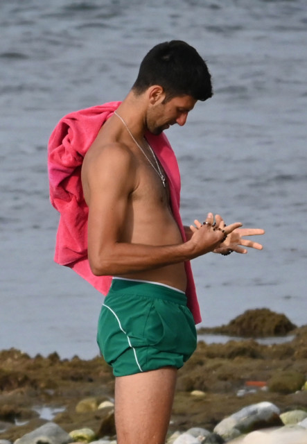 , Novak Djokovic enjoys Marbella beach after breaking coronavirus lockdown rules to play on clay tennis court