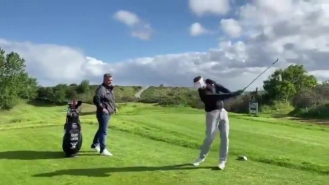 , Moment golfer ‘almost kills’ girlfriend by whacking her with ball as she films him ‘mastering social distancing’ swings