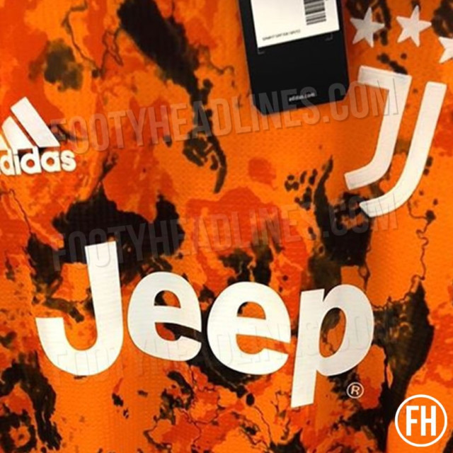Juventus third shirt has an orange base and is splattered in black