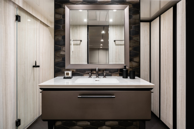 This bathroom is adjoined to the master suite