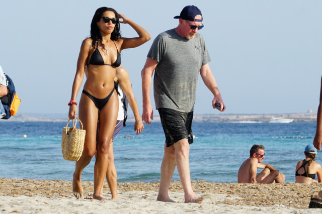 , Tennis legend Boris Becker looks loved up on beach with stunning girlfriend Lilian De Carvalho Monteiro