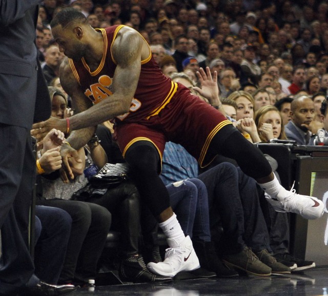 LeBron pictured flying into the crowd