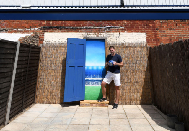 , Footie fan creates ‘magic door’ to local team Portsmouth’s stadium from his back garden