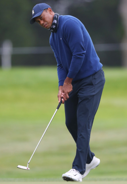 , Tiger Woods ditches £70MILLION putter for one kinder to his back as he shoots into contention at PGA Championship
