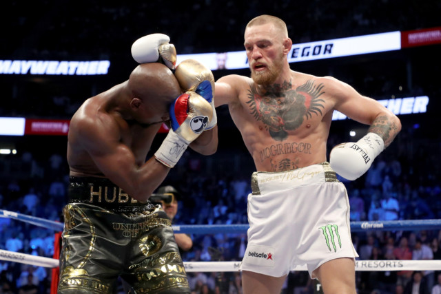 , Conor McGregor taunts Floyd Mayweather on three-year fight anniversary as UFC legend claims he ‘carried’ boxer