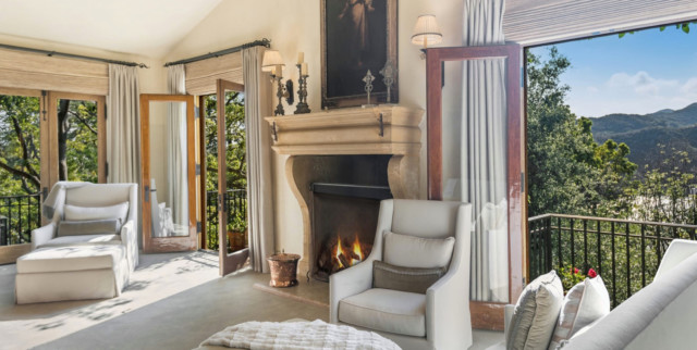 The sitting room has a balcony with views of the Santa Monica mountains