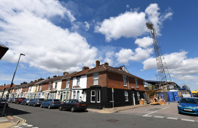 , Footie fan creates ‘magic door’ to local team Portsmouth’s stadium from his back garden