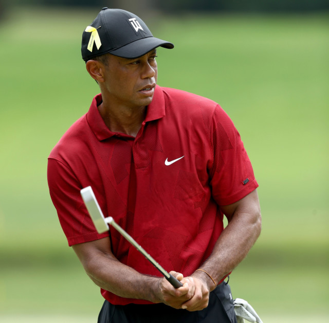 , Tiger Woods ditches £70MILLION putter for one kinder to his back as he shoots into contention at PGA Championship