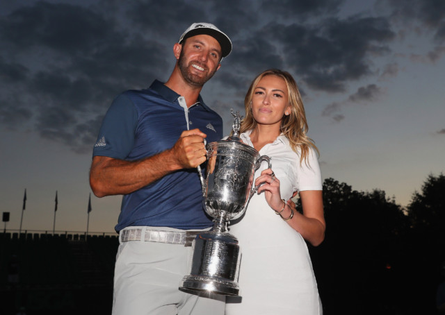 Dustin Johnson shows off his US Open trophy last year with Paulina