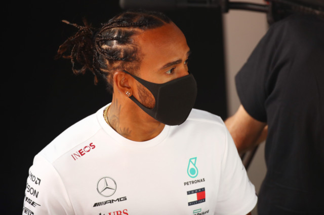 , Lewis Hamilton wears daring hoodie showing bikini-clad model as Mercedes star arrives for Sochi F1 Grand Prix