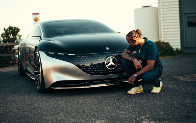 , Lewis Hamilton shows off new £80k EQS fully electric Mercedes which goes 0-60mph in 4.5 secs and has holographic lights