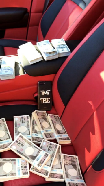 Often Mayweather's cars are loaded with wads of cash