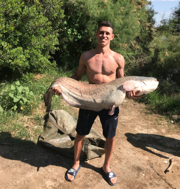 On a fishing holiday in Spain Foden caught a a 130lb Catfish
