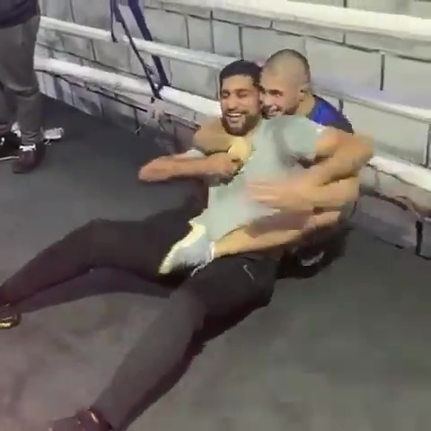 , Watch as struggling Amir Khan is forced to tap out in ring after being given a masterclass by MMA ace Muhammad Mokaev