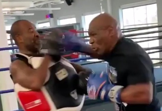 , Watch ferocious Mike Tyson almost knockout his OWN trainer as 54-year-old shows off brutal power and speed in training