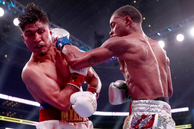 Errol Spence Jr defended his IBF welterweight world title for the fourth time by beating Mikey Garcia