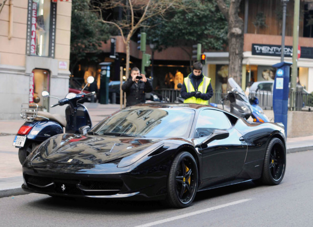 Ozil has also been seen in a £200k Ferrari 458 Italia