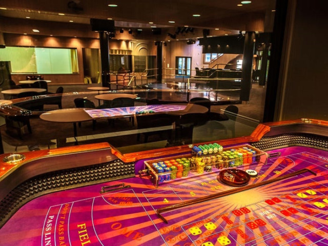 Another games room has poker and roulette tables