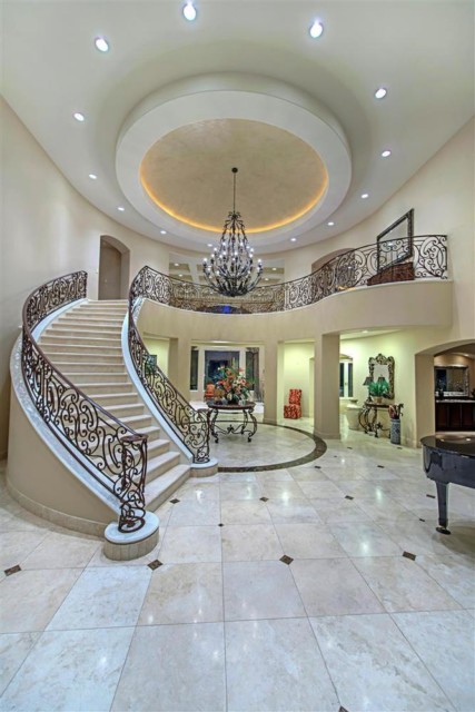 The luxurious entrance features stunning marble floors