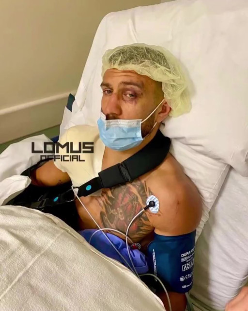 , Vasyl Lomachenko shows off gruesome shoulder surgery scars as he poses in hospital bed after shock Teofimo Lopez loss