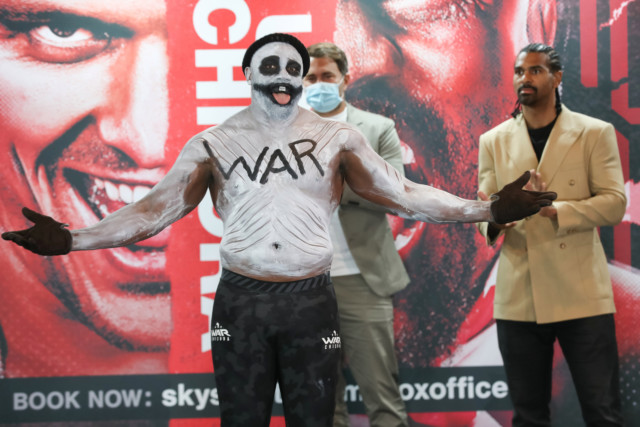 , Derek Chisora weighs-in for Oleksandr Usyk showdown in terrifying Halloween outfit with ‘WAR’ painted across his chest