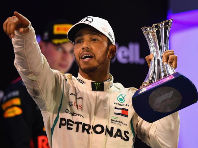 Lewis Hamilton takes to the podium at the Abu Dhabi Grand Prix in 2018