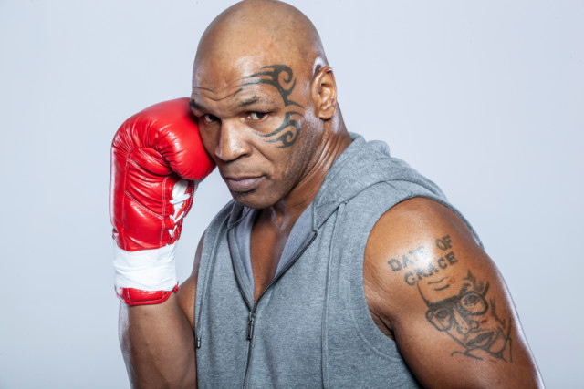 An Arthur Ashe tattoo completes Tysons body art