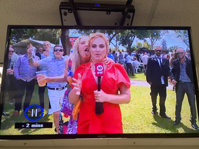 , Shocking moment TV reporter is MOONED and licked on ear during live coverage of Melbourne Cup